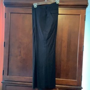 Woman’s black satin pants.